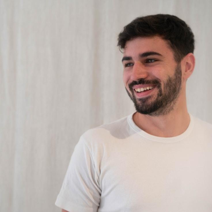 Jordan Reed, Client Relations Director, discussing corporate gifting strategy with business clients